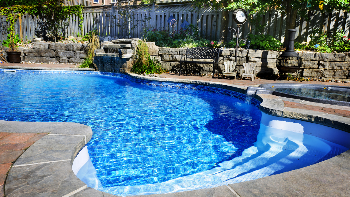 A fibreglass pool with spillover spa