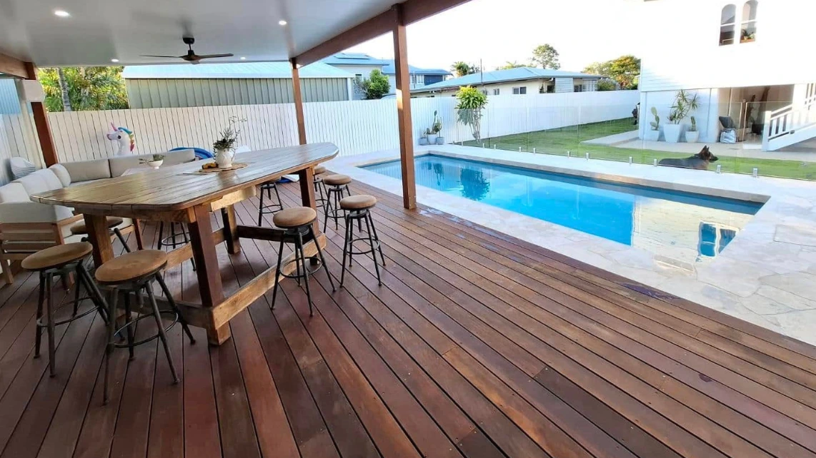 An image of a fibreglass pool with patio, taken and installed by Pool Professionals Mackay