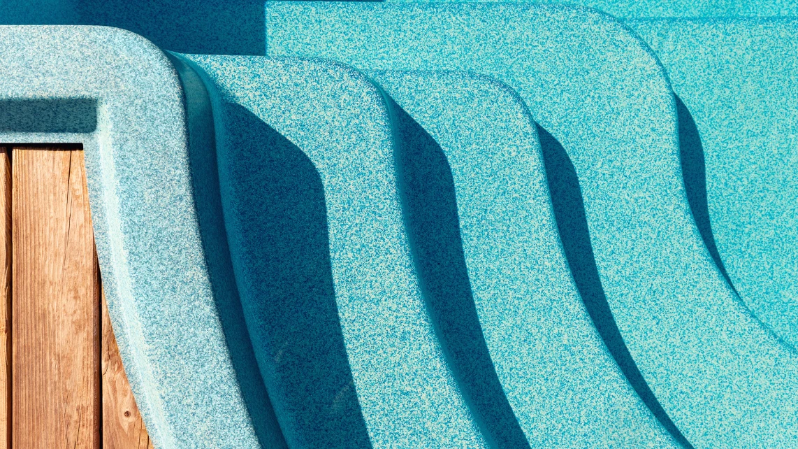An image of a fibreglass pool's steps filled with water