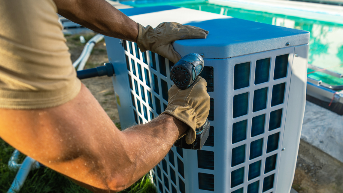 A pool heater being cleaned and fixed