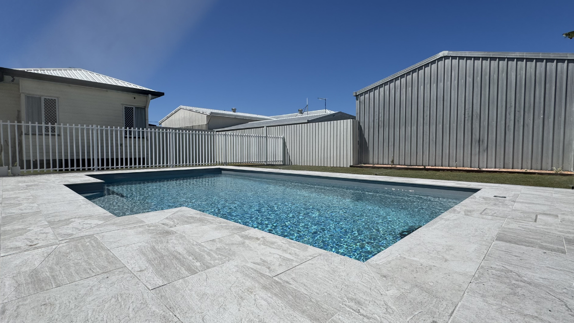 An image of a fully installed fibreglass pool, installed and taken by Pool Professionals Mackay