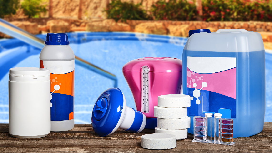 An image of different pool cleaning agents or chemicals as ways to remove inorganic stains